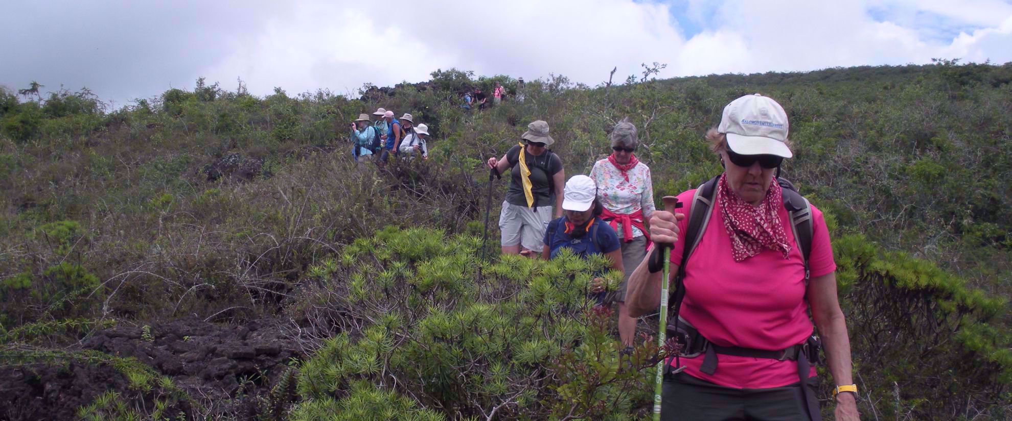 women on travel tour hiking through galapagos