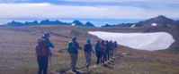 Picture of Pacific Northwest Escape: The San Juan Islands & Olympic National Park women hiking through snowy mountains olympic national park