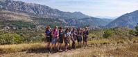 women pose for group photo on travel tour to croatia