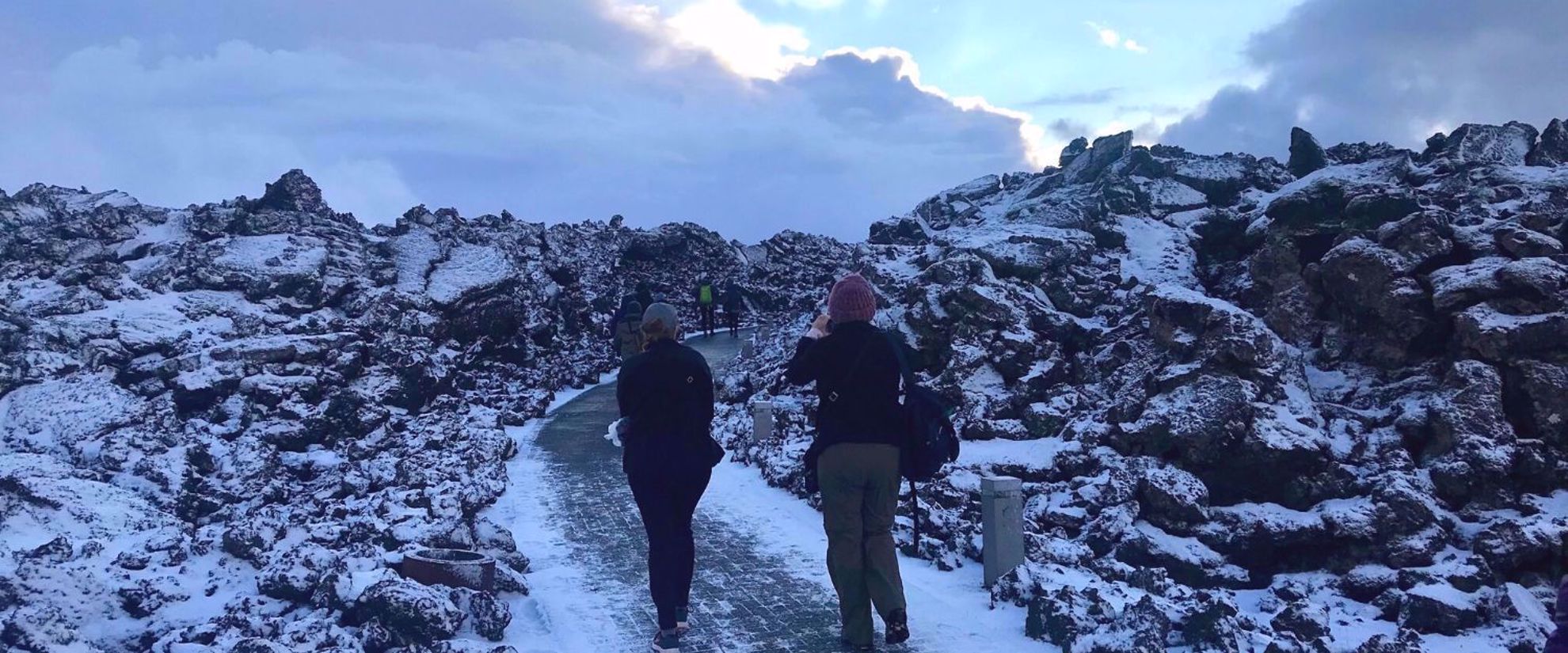 women hiking on glacier iceland